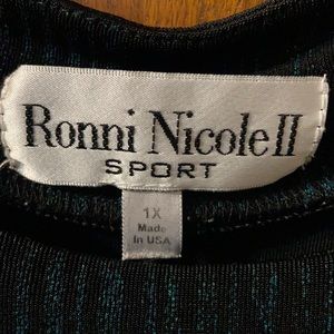 Very nice sleeveless black with dark green dress.